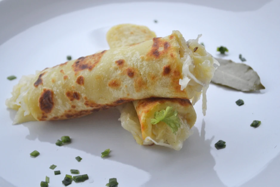 Erd&auml;pfelflecken mit Sauerkraut