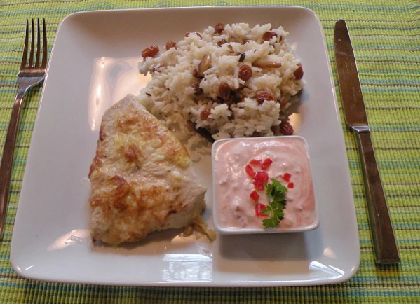 Gebratenes Curryhuhn mit Mandel-Rosinenreis