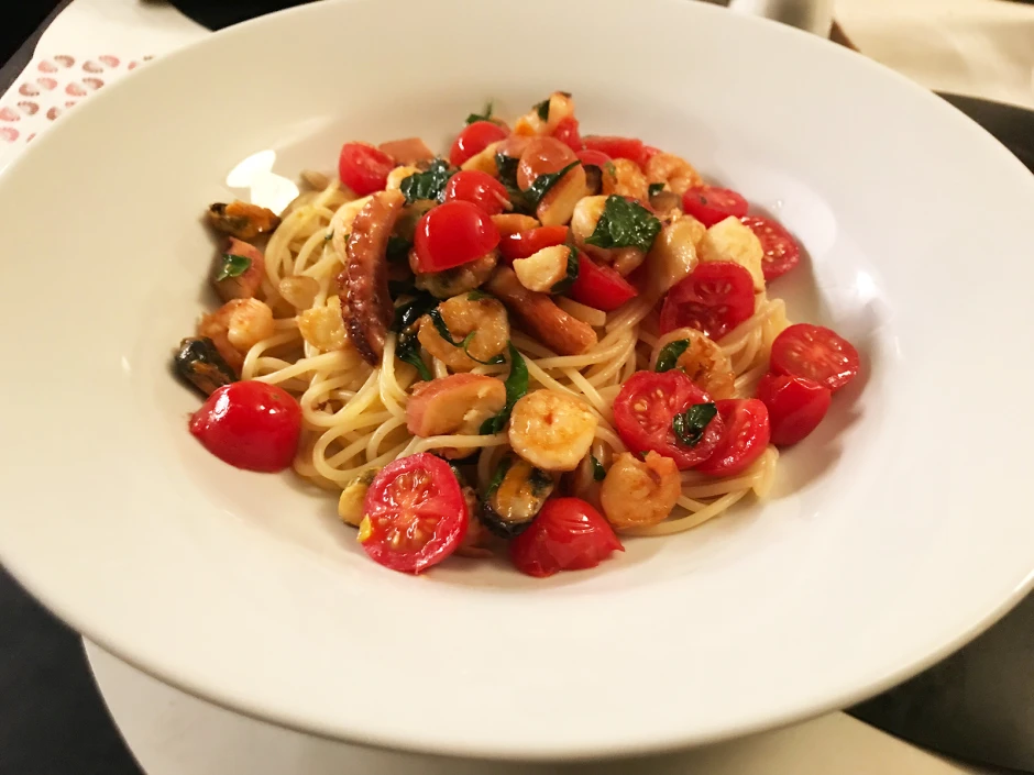 Spaghetti mit Meeresfr&uuml;chten und warmen Paradeisern