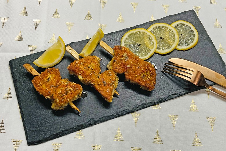 Schweinslungenbratenspieße in Parmesanpanade