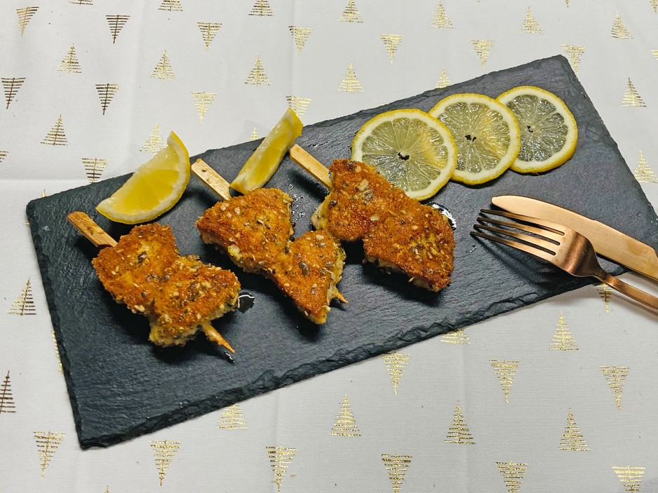 Schweinslungenbratenspieße in Parmesanpanade