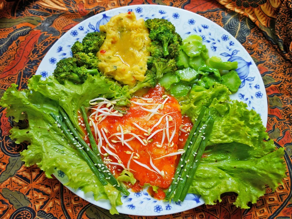 Doradenfilet im Salatbett mit S&uuml;&szlig;kartoffelbrei ala Mandarin
