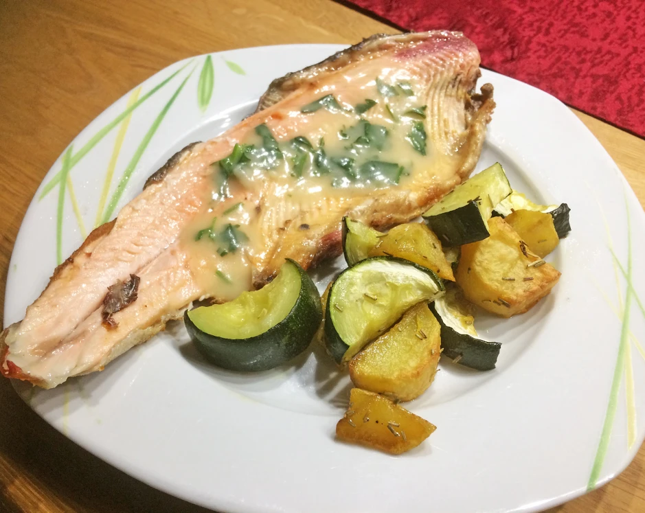 Forellen in Kräutersoße
