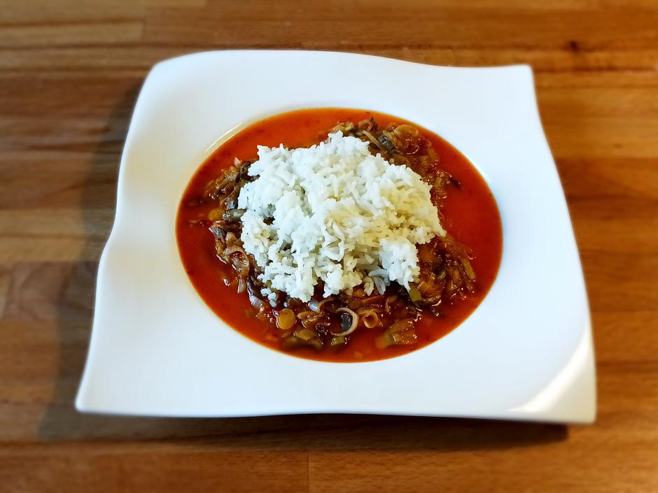 Reis auf scharfer Champignonsauce