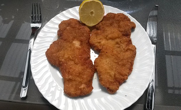 Panierte Schnitzel mit Knoblauch - Rezept