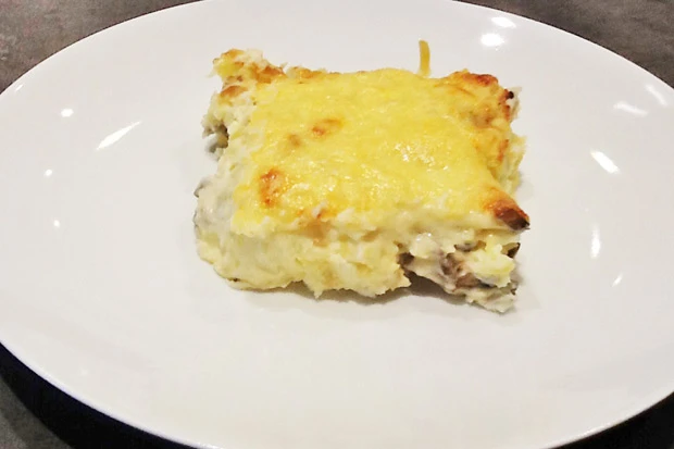 &Uuml;berbackene Kartoffel mit Champignons