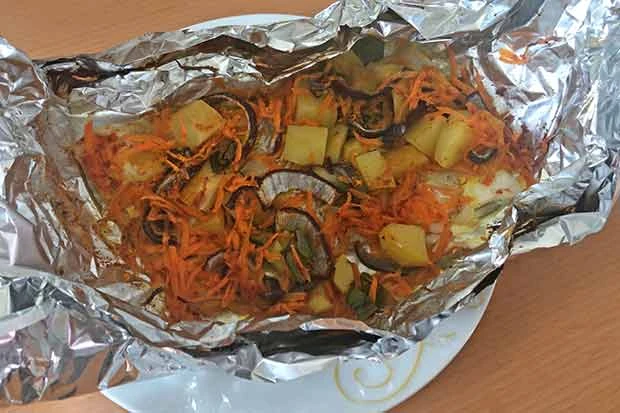 Ged&uuml;nsteter Fisch mit Gem&uuml;se