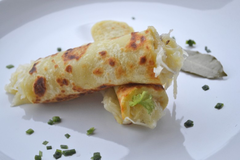 Erdäpfelflecken mit Sauerkraut