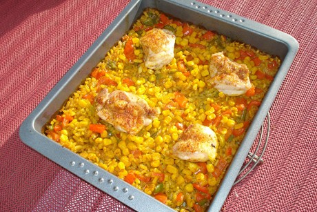 Hühnerschenkel auf Reis