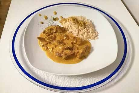 Ziegenfleisch in Käsesauce