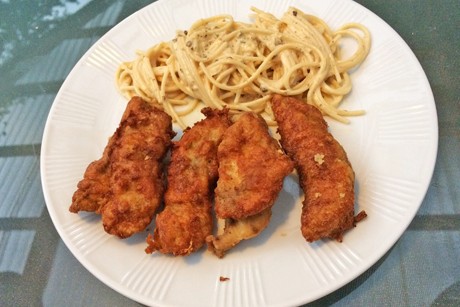 Wolfsbarsch in Parmesanpanier