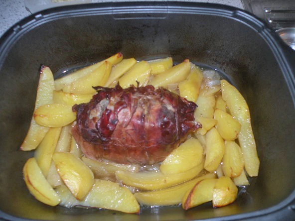 Schweinsbraten in Parmaschinken